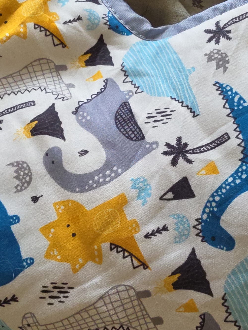 Cute Dino Print  - Yellow, Blue, Gray Shoping Cart Liner For Toddlers.